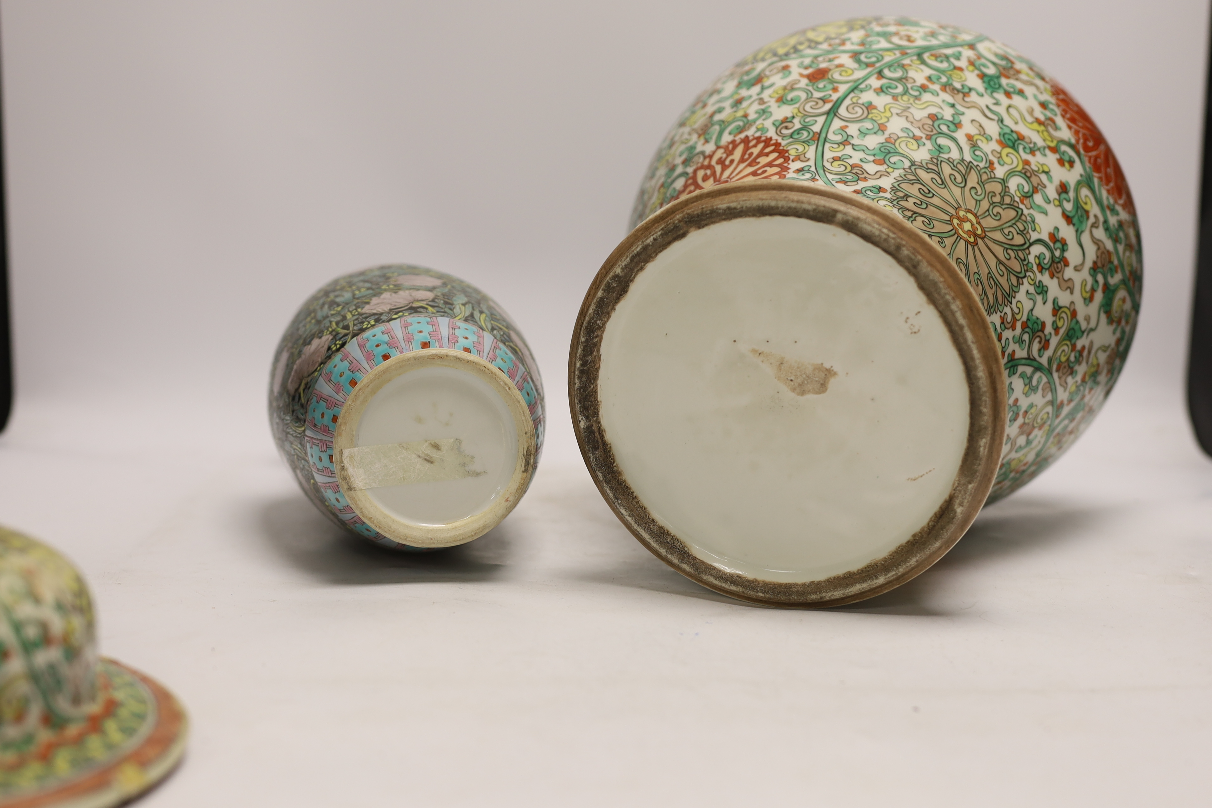 A large Chinese famille verte baluster jar and cover and a famille noir vase, tallest 40cm